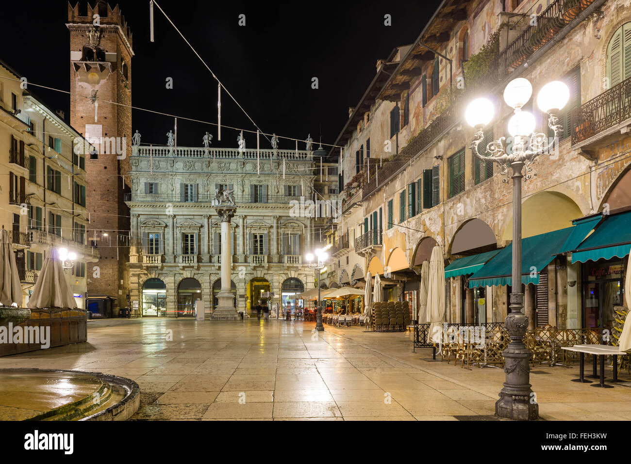 Nightview of Piazza delle Erbe, also called Market Square, where the forum was during the roman empire Stock Photo