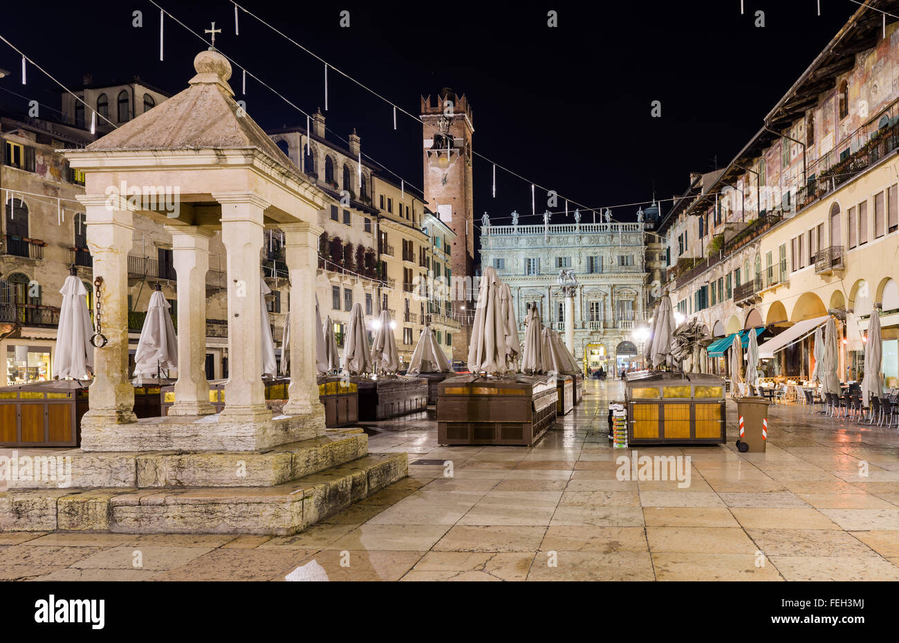 Nightview of Piazza delle Erbe, also called Market Square, where the forum was during the roman empire Stock Photo