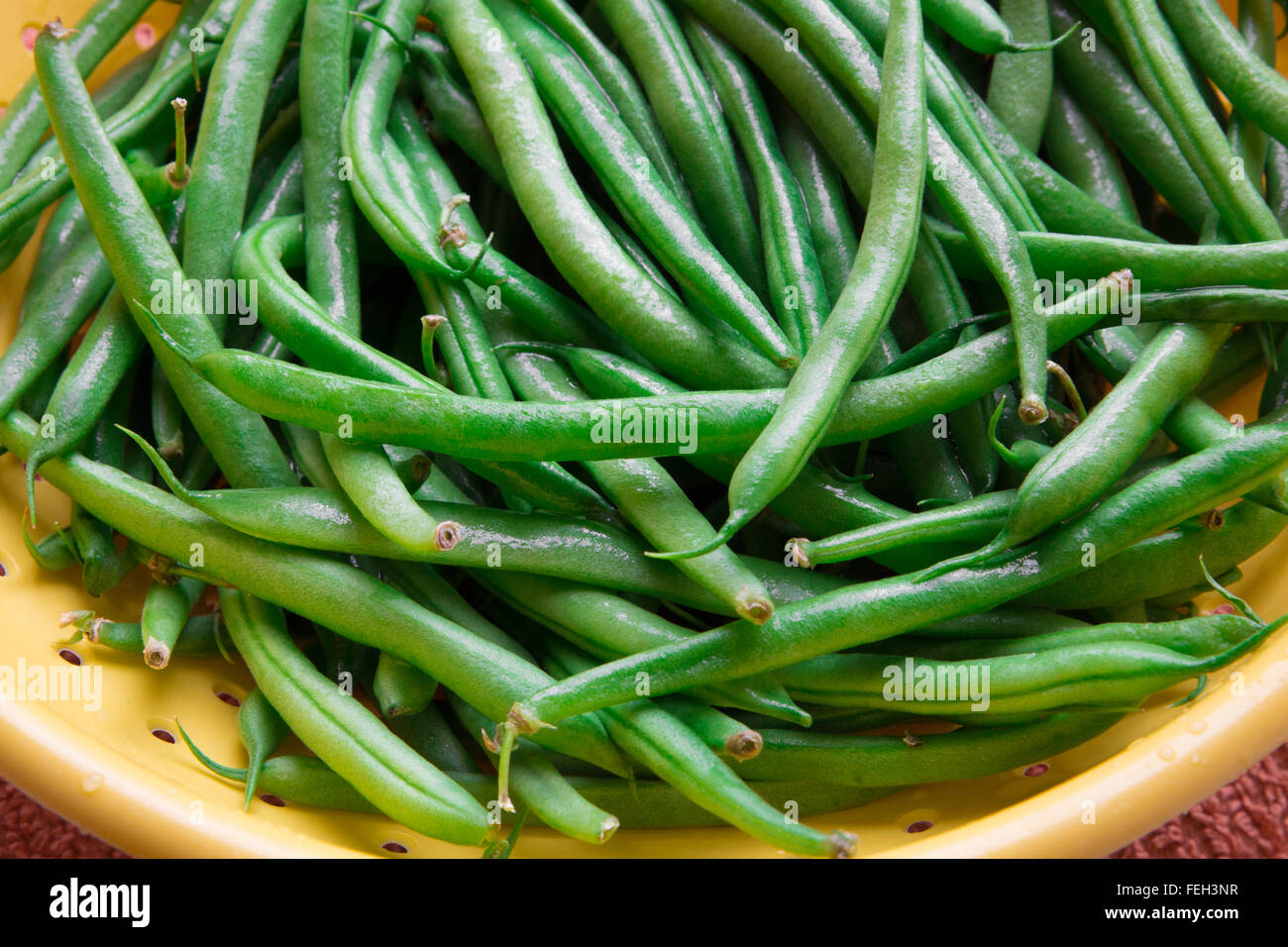 Fresh green beans in colander Stock Photo - Alamy