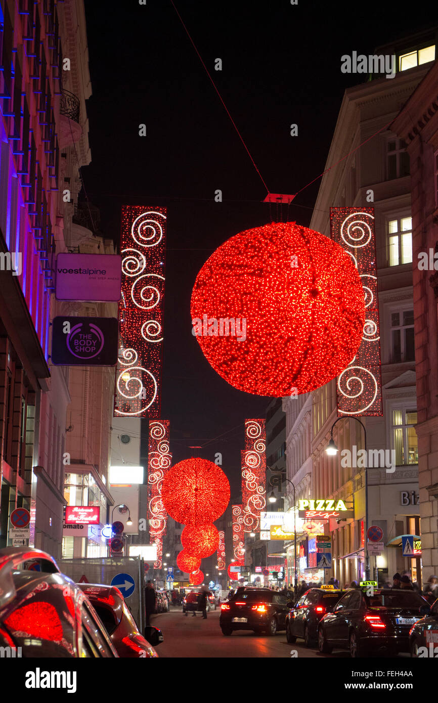 Illuminated Christmas street decorations at night in Vienna Stock Photo