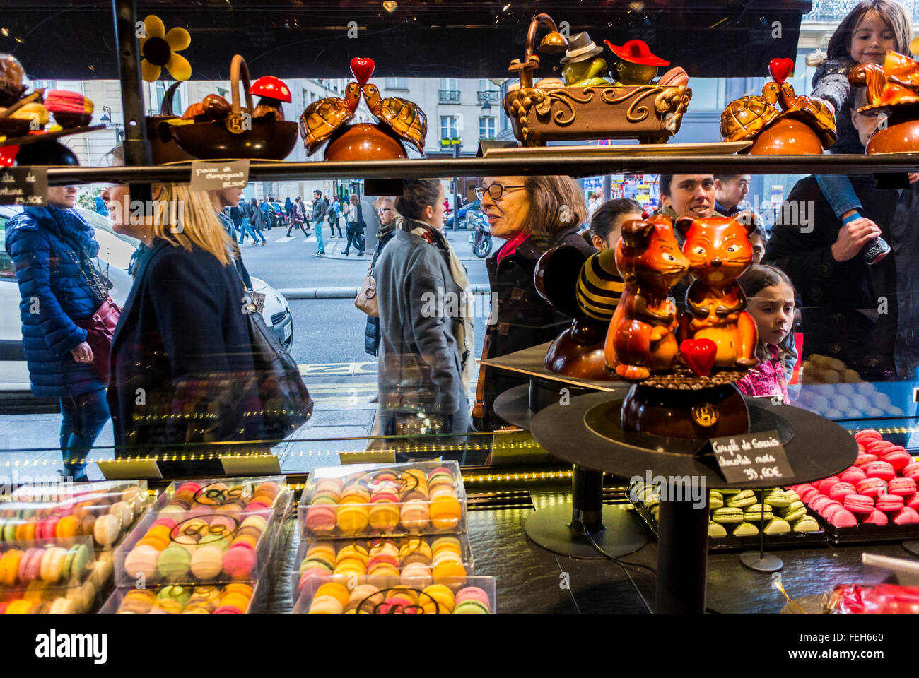 Paris, France, People Shopping, in Le Marais, Chocolate SHop Front WIndow, Inside, French Chocolatier, Maison Geroges Larnicol, sweet shop shelves Stock Photo
