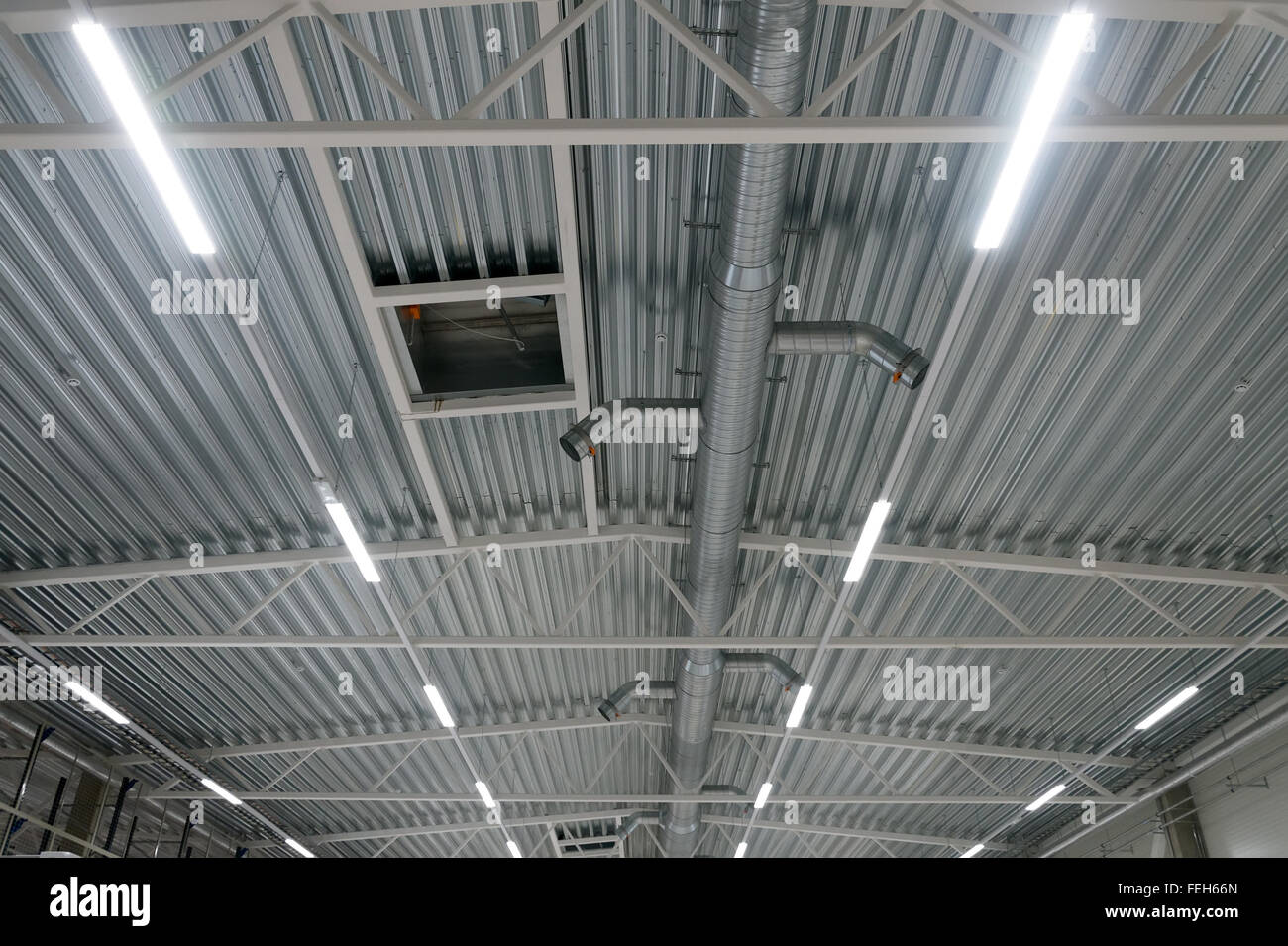 Image showcasing Industrial steel ventilation pipes inside of building Stock Photo - Alamy