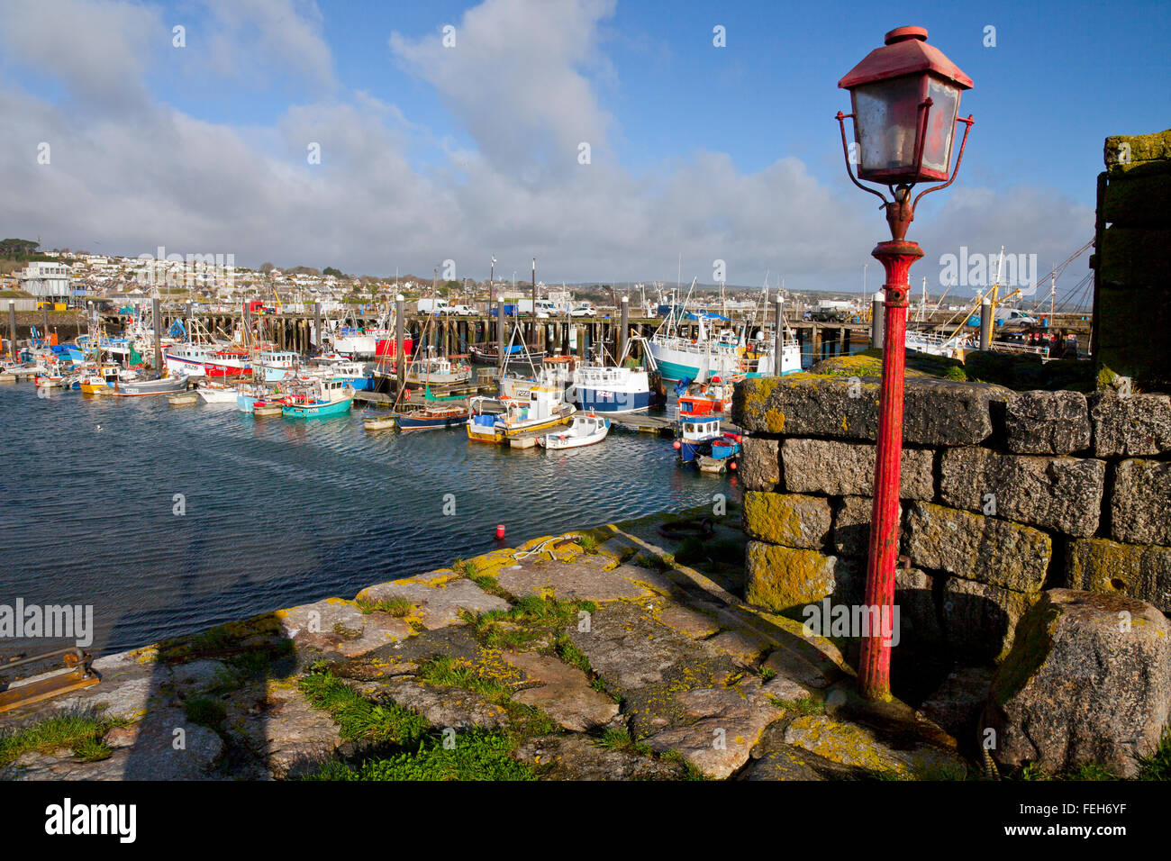 The original breakwater light at the entrance to the old harbour in Newlyn, Cornwall, England