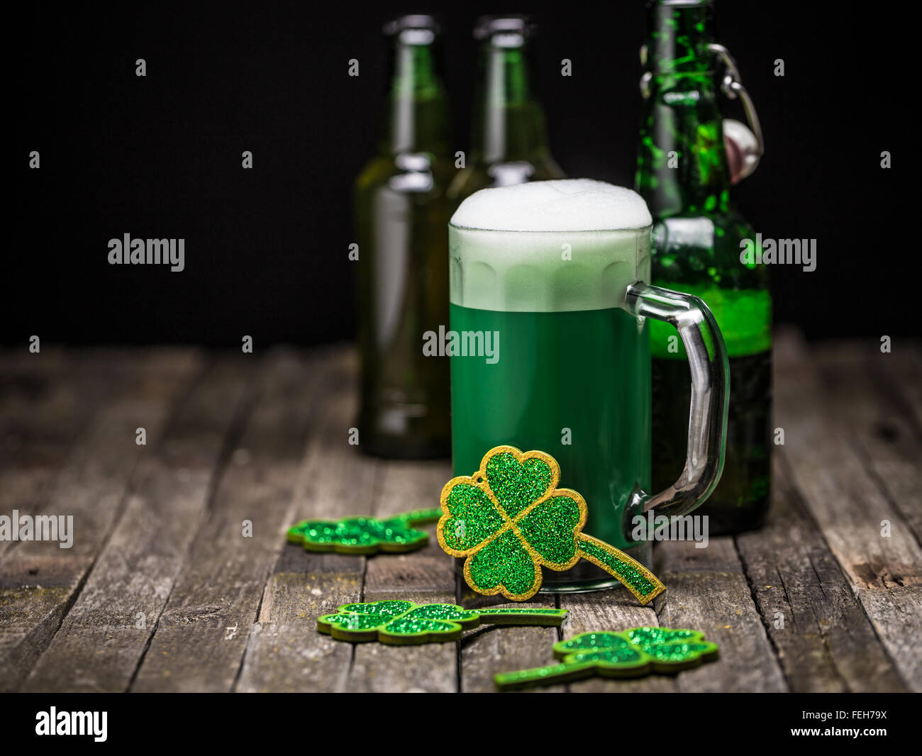 St. Patrick's day holiday celebration, lucky clover and green beer Stock Photo