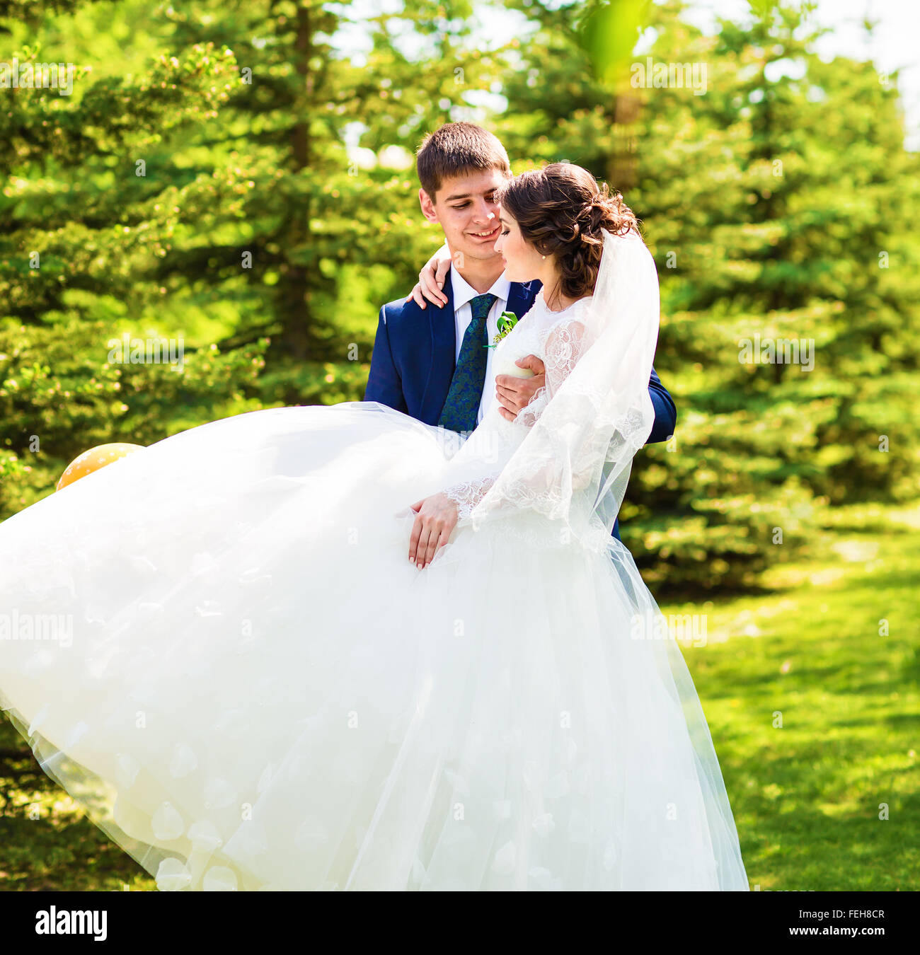 Happy bride and groom on their wedding day Stock Photo - Alamy