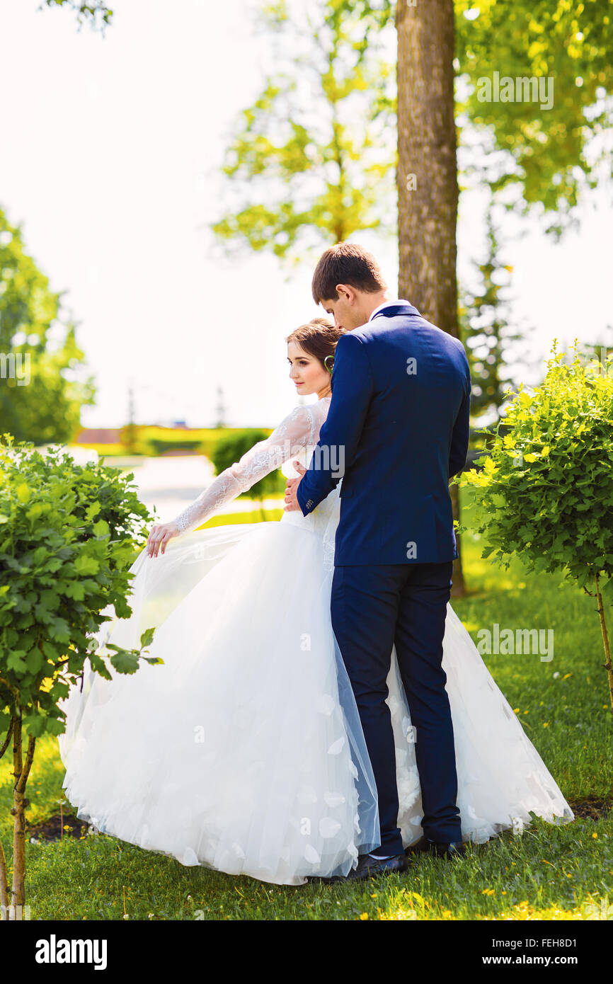 Happy bride and groom on their wedding day Stock Photo - Alamy