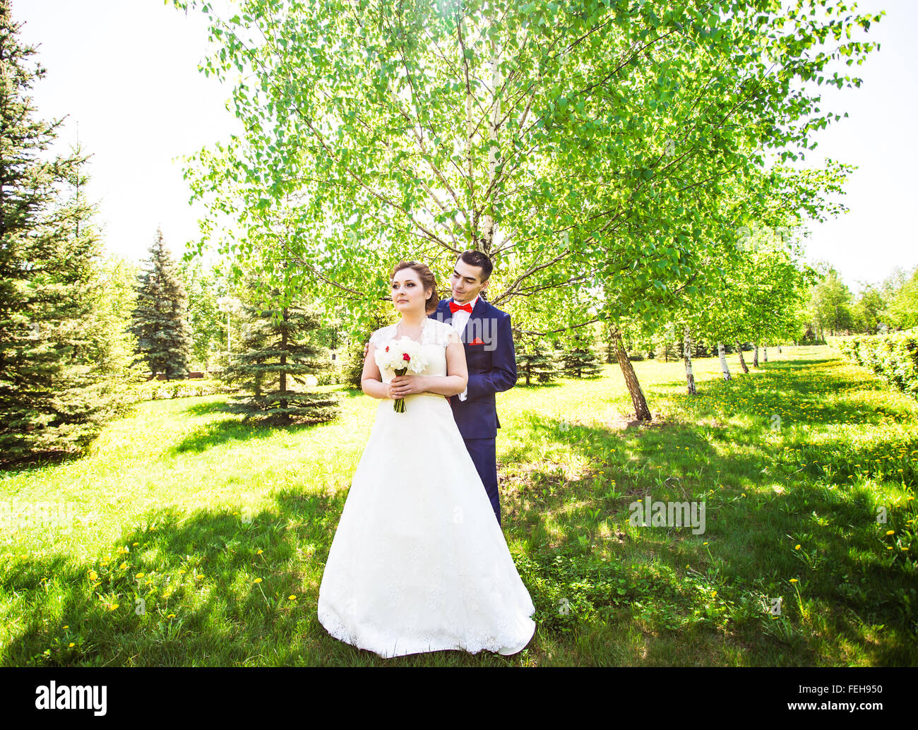 Happy bride and groom on their wedding day Stock Photo - Alamy