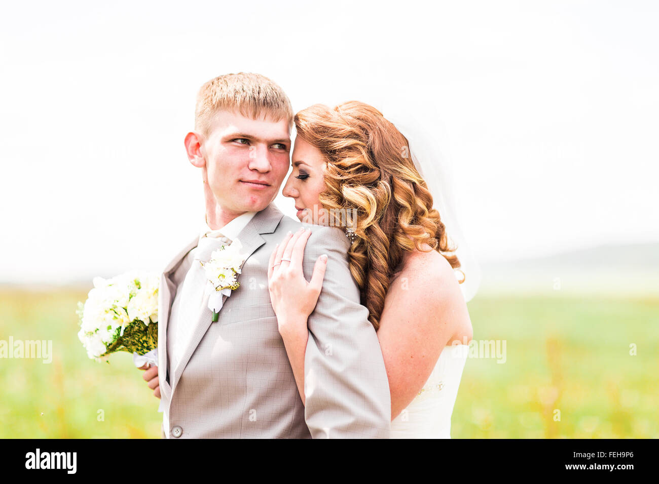 Happy bride and groom on their wedding day Stock Photo - Alamy