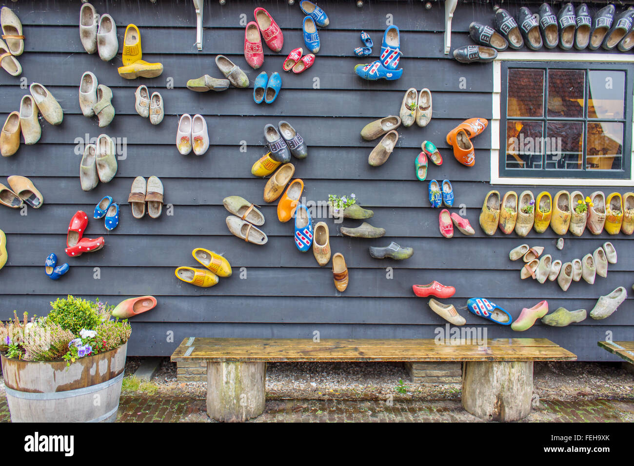 Dutch traditional wooden shoes on the wall Stock Photo