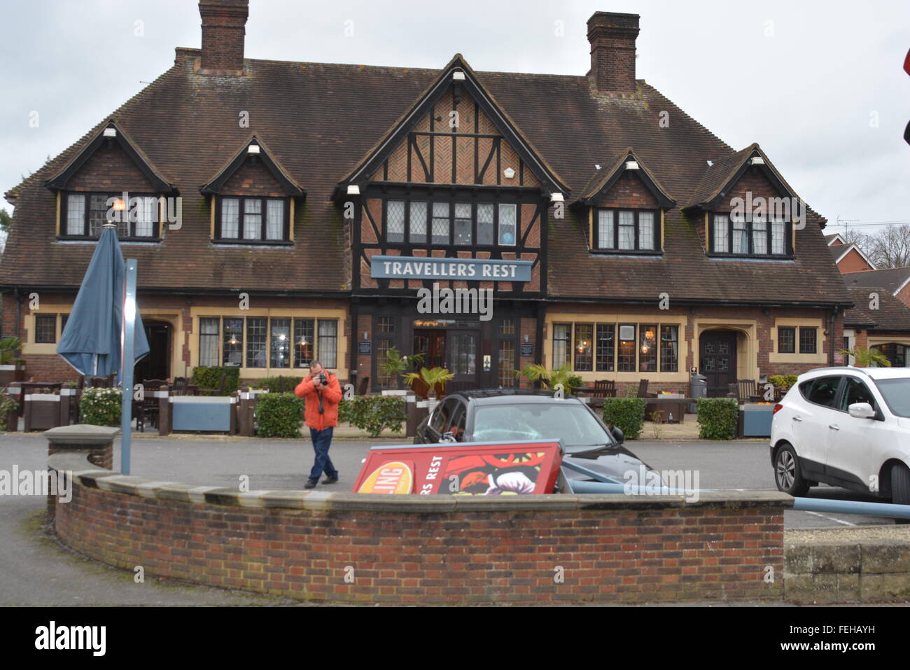 Reading, Berkshire, UK. 07th Feb, 2016. 2014 Plate BMW gets smashed by the Travellers Rest sign outside the premises believed to be caused by the high speed wind, on the Henley road in Reading. Management would not comment on the subject. Credit:  Charles Dye/Paul King/Alamy Live News Stock Photo