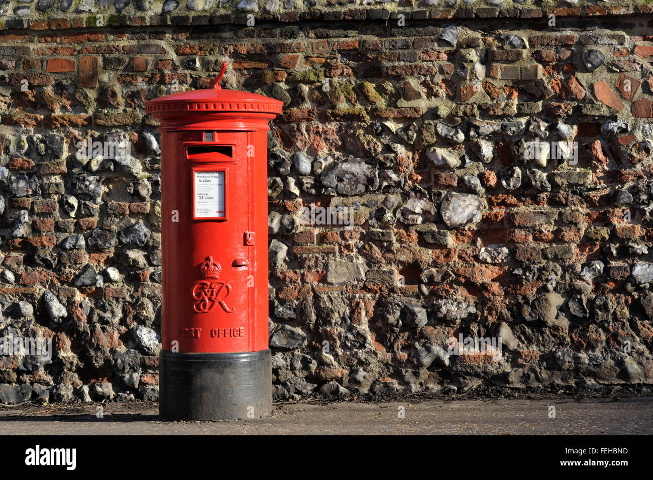 George VI pillar box or post box on a UK street. Stock Photo