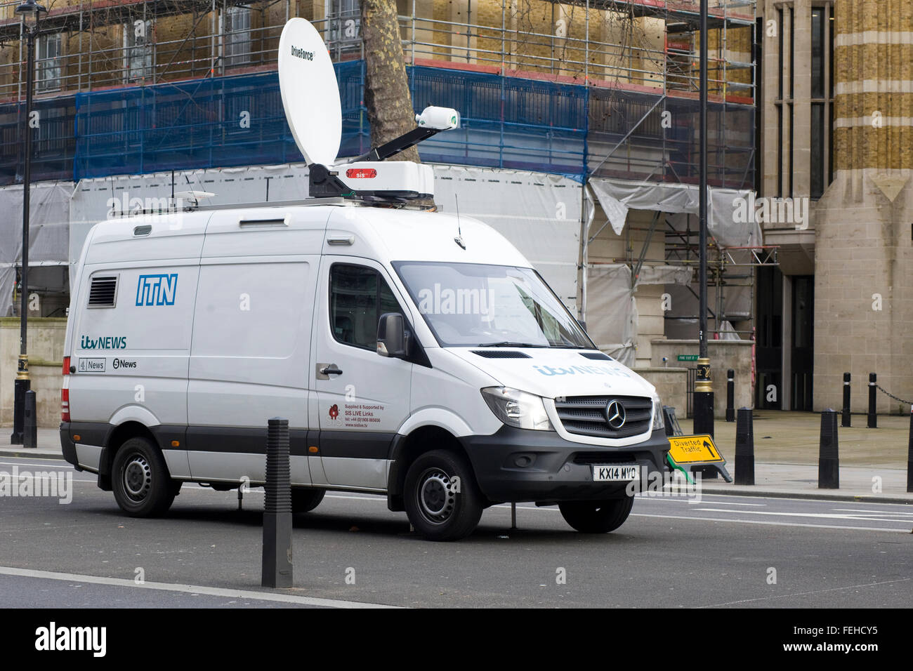 ITN News Van with a Drive force satellite Dish Parked outside 10 Downing street Whitehall London Stock Photo