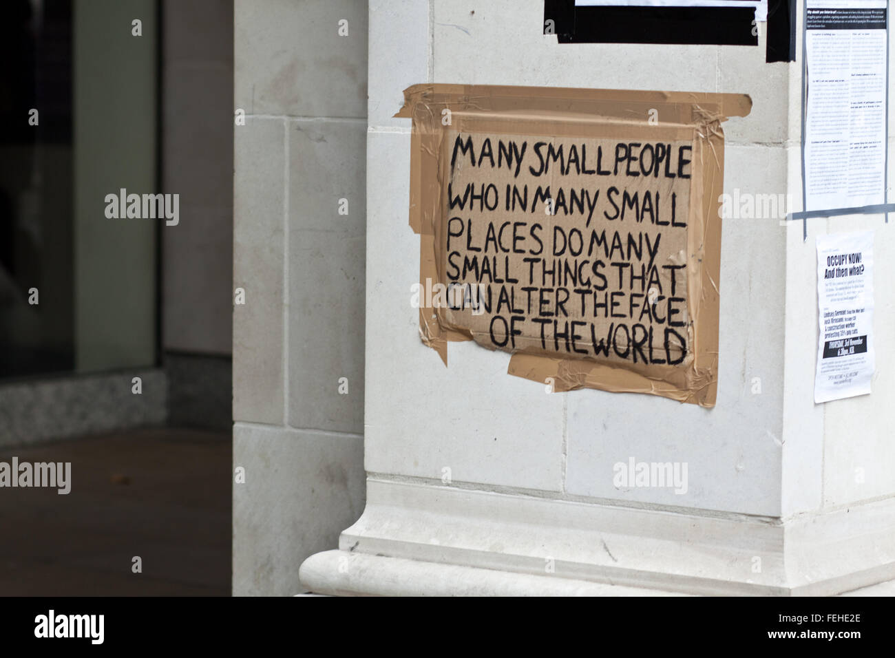 Hand-written sign on display during Occupy London protest by St. Paul's ...