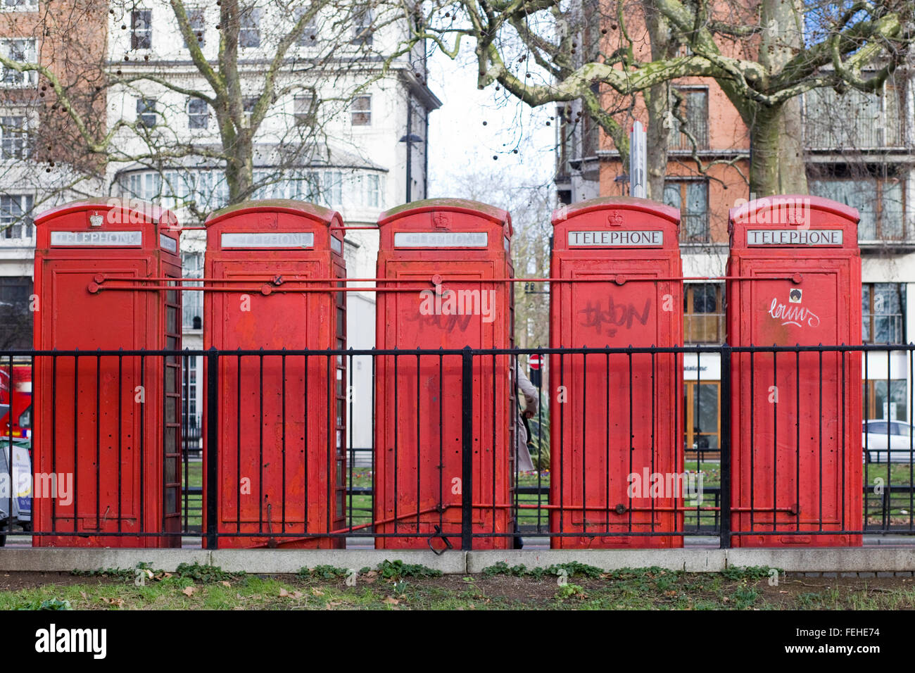 Back view of Red Public Telephone Boxes on the streets of London England Stock Photo