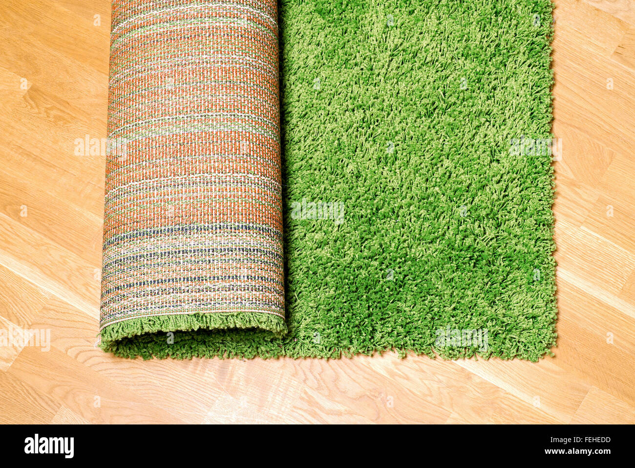 rolled carpet on the floor Stock Photo Alamy