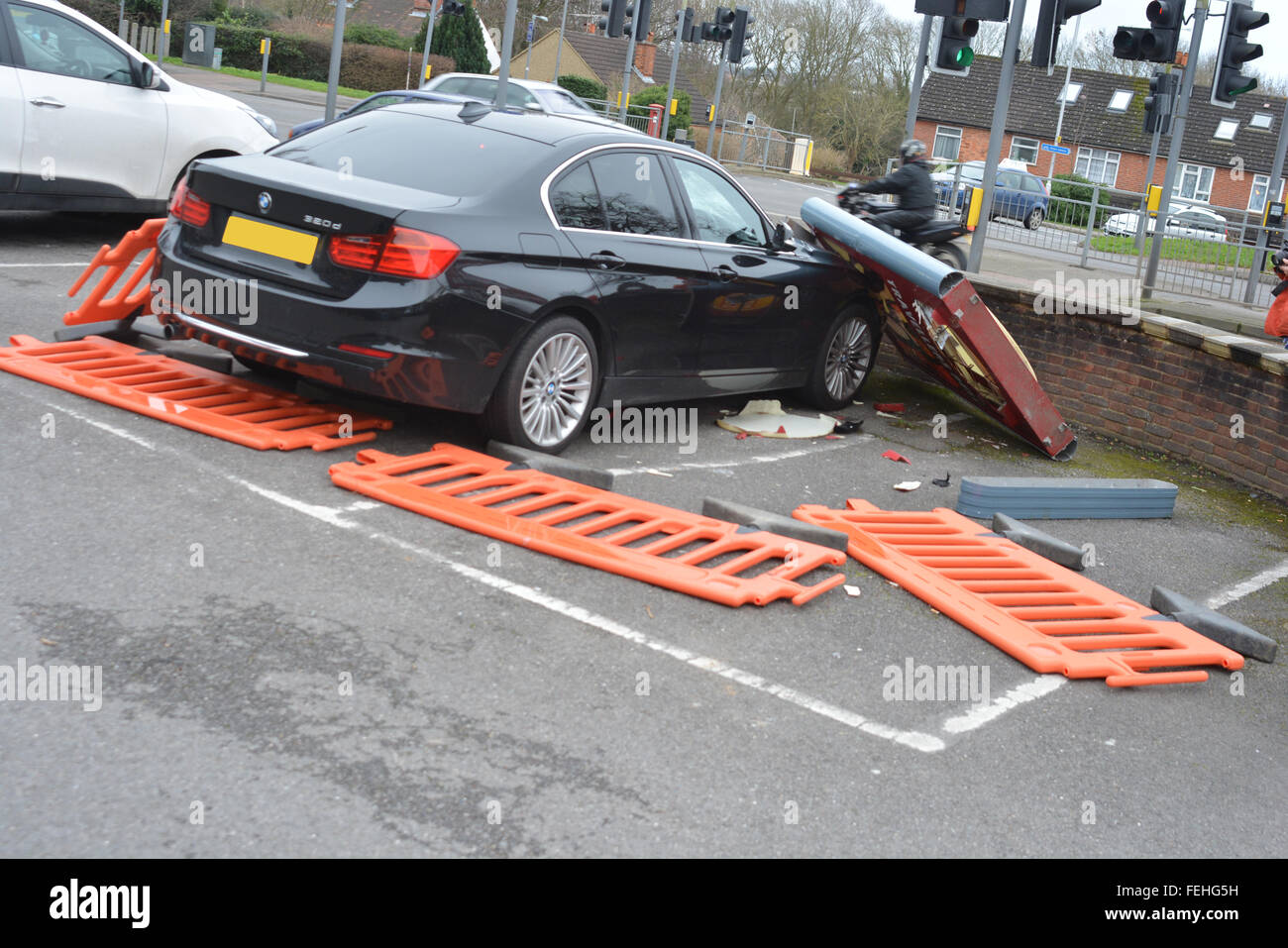 Reading, Berkshire, UK. 07th Feb, 2016. 2014 Plate BMW gets smashed by the Travellers Rest sign outside the premises believed to be caused by the high speed wind, on the Henley road in Reading. Management would not comment on the subject. Credit:  Charles Dye/Alamy Live News Stock Photo