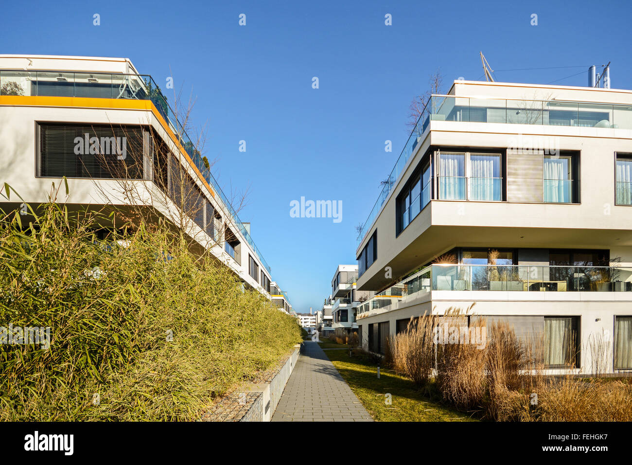 Modern residential buildings with outdoor facilities, Facade of new low-energy apartment houses Stock Photo