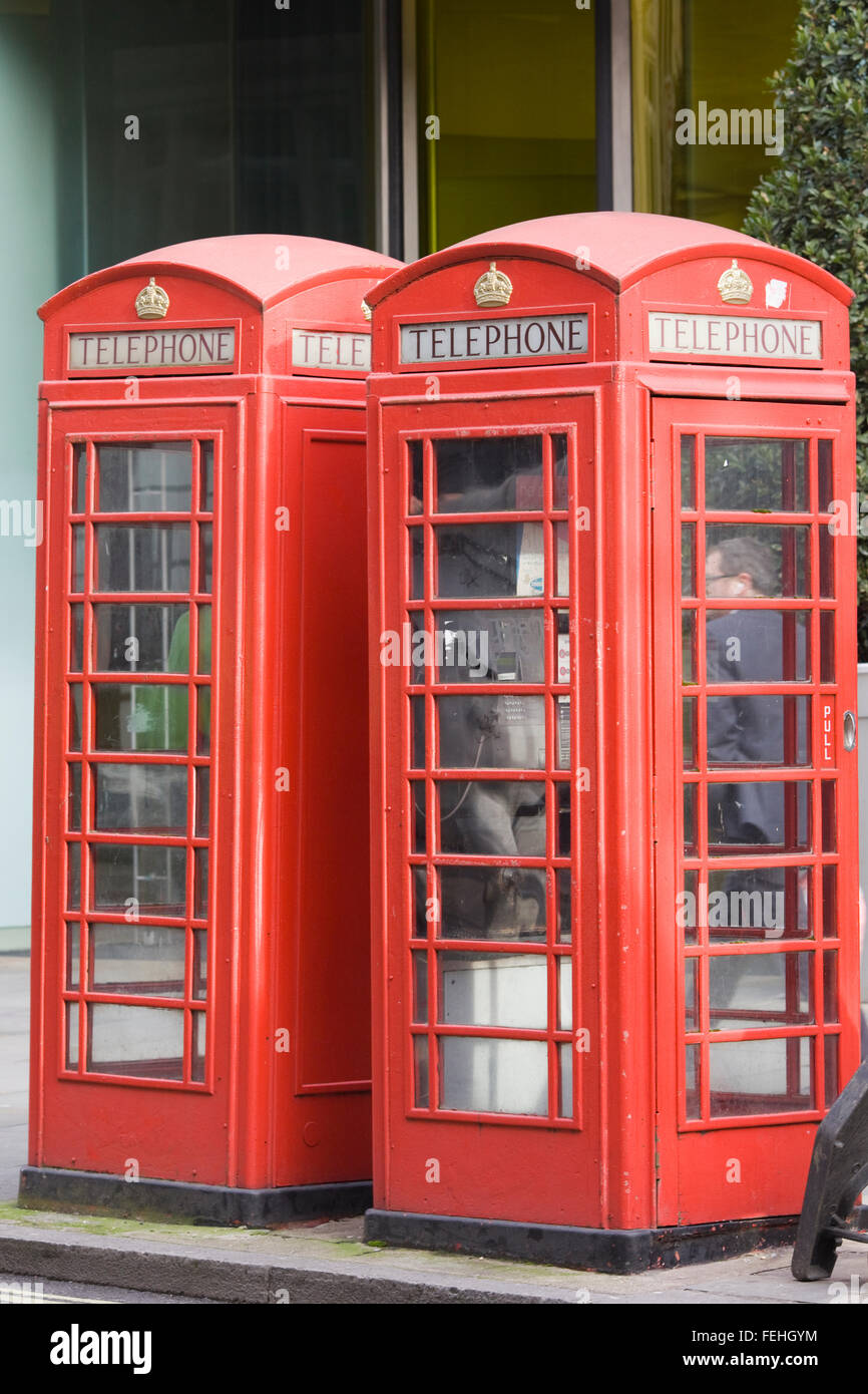 Red Public Telephone Boxes on the streets of London England Stock Photo