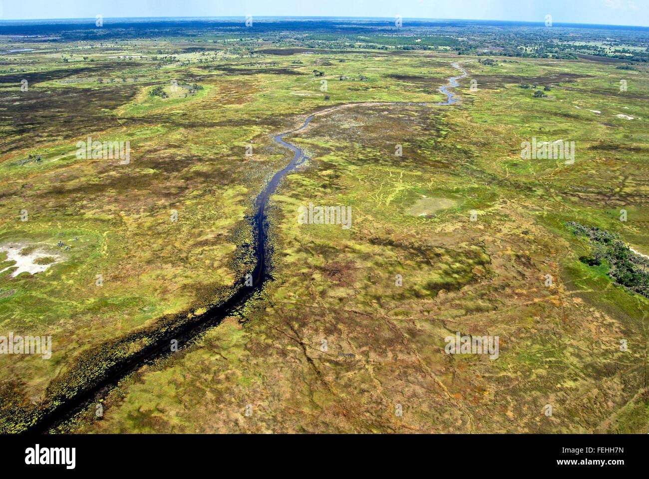 Flight over the Okavango Delta: Aerial View at a river, Botswana Africa Stock Photo