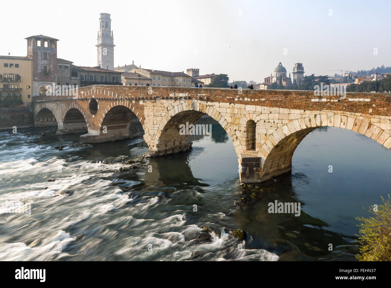Ponte Pietra on river Adige, ancient roman bridge in the old town of ...