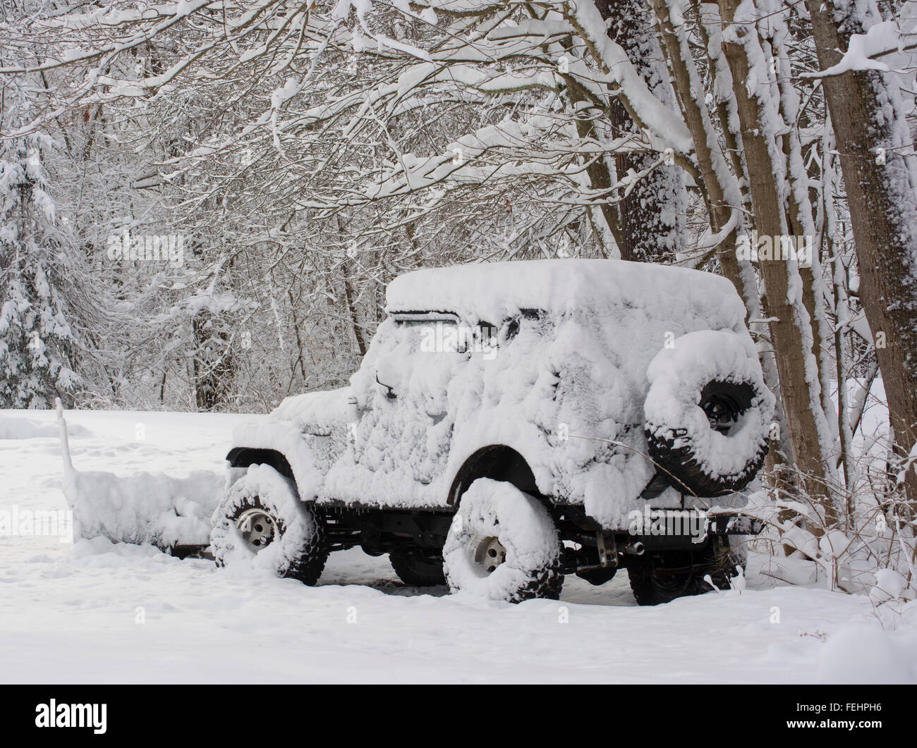 Jeep covered in snow Stock Photo