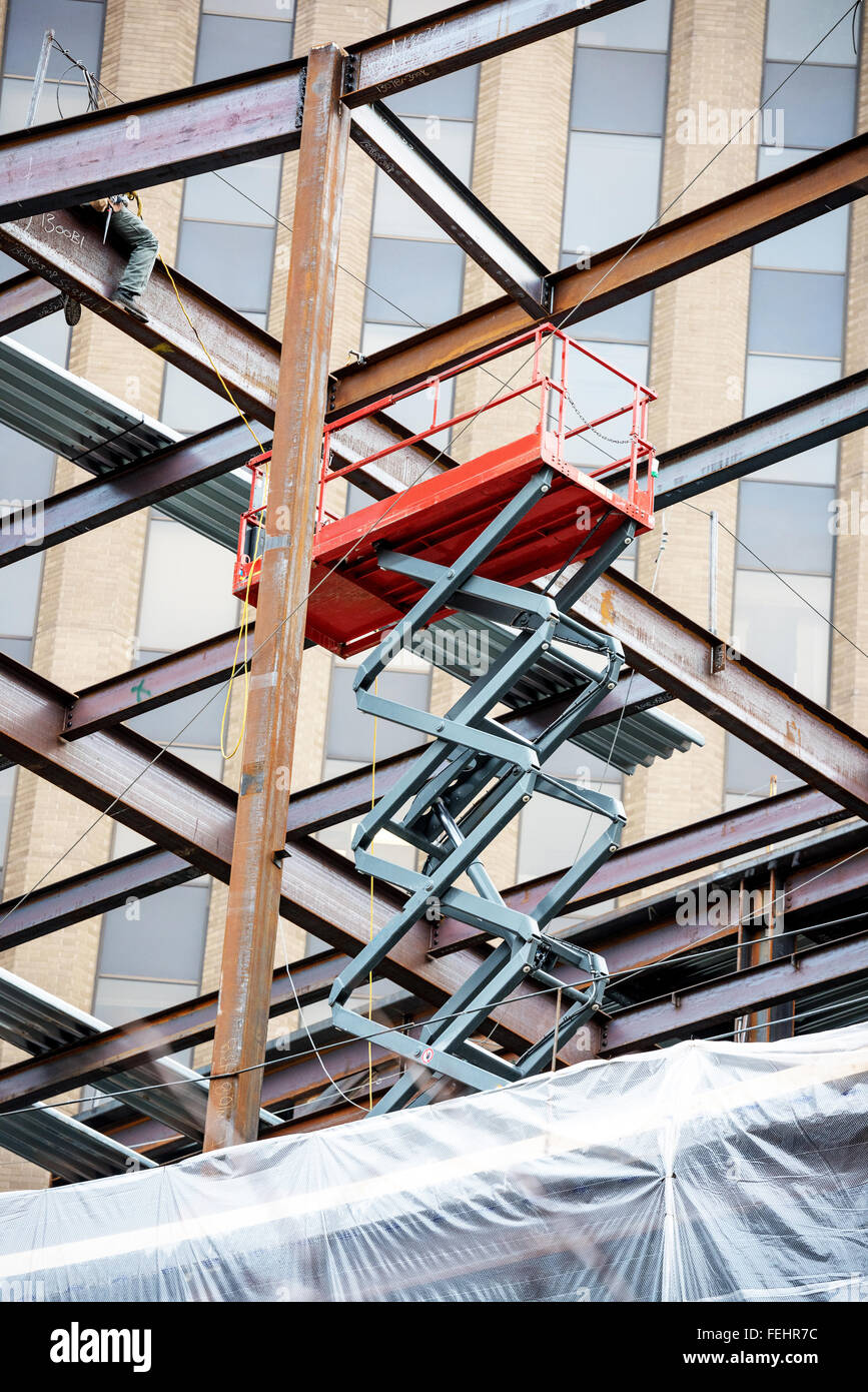 Commercial construction I beams with hoist lift Stock Photo Alamy