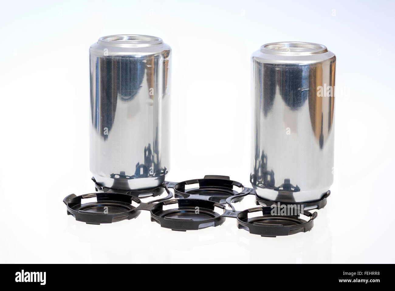 Inverted Can Generic Aluminum cans in a holder upside down Stock Photo - Alamy