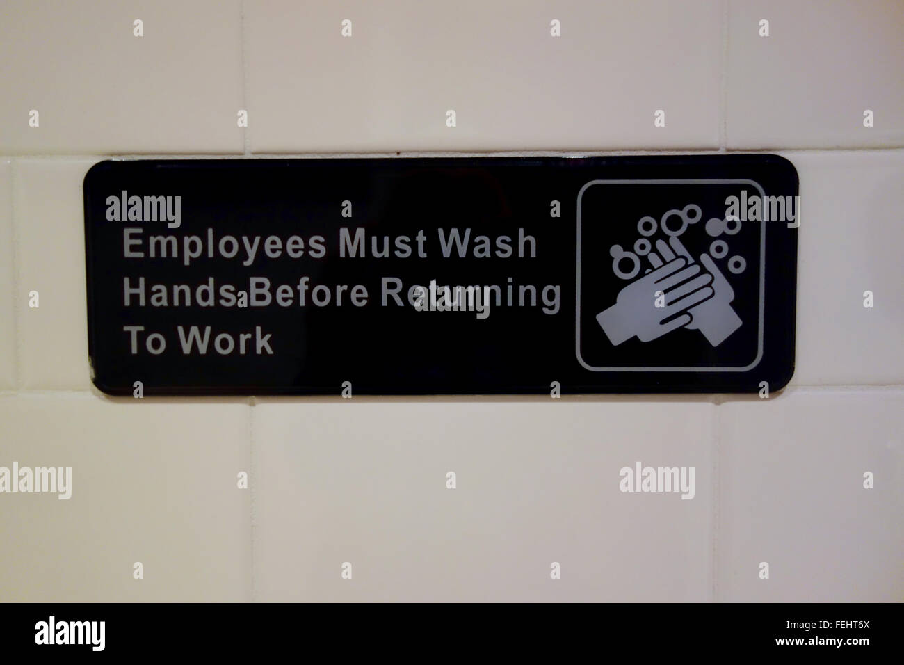 Employees Must Wash Hands Before Returning to Work Stock Photo