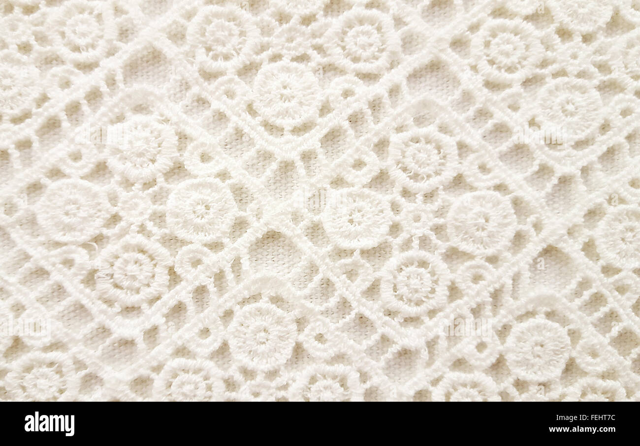 Close up of off white crochet lace background. Stock Photo