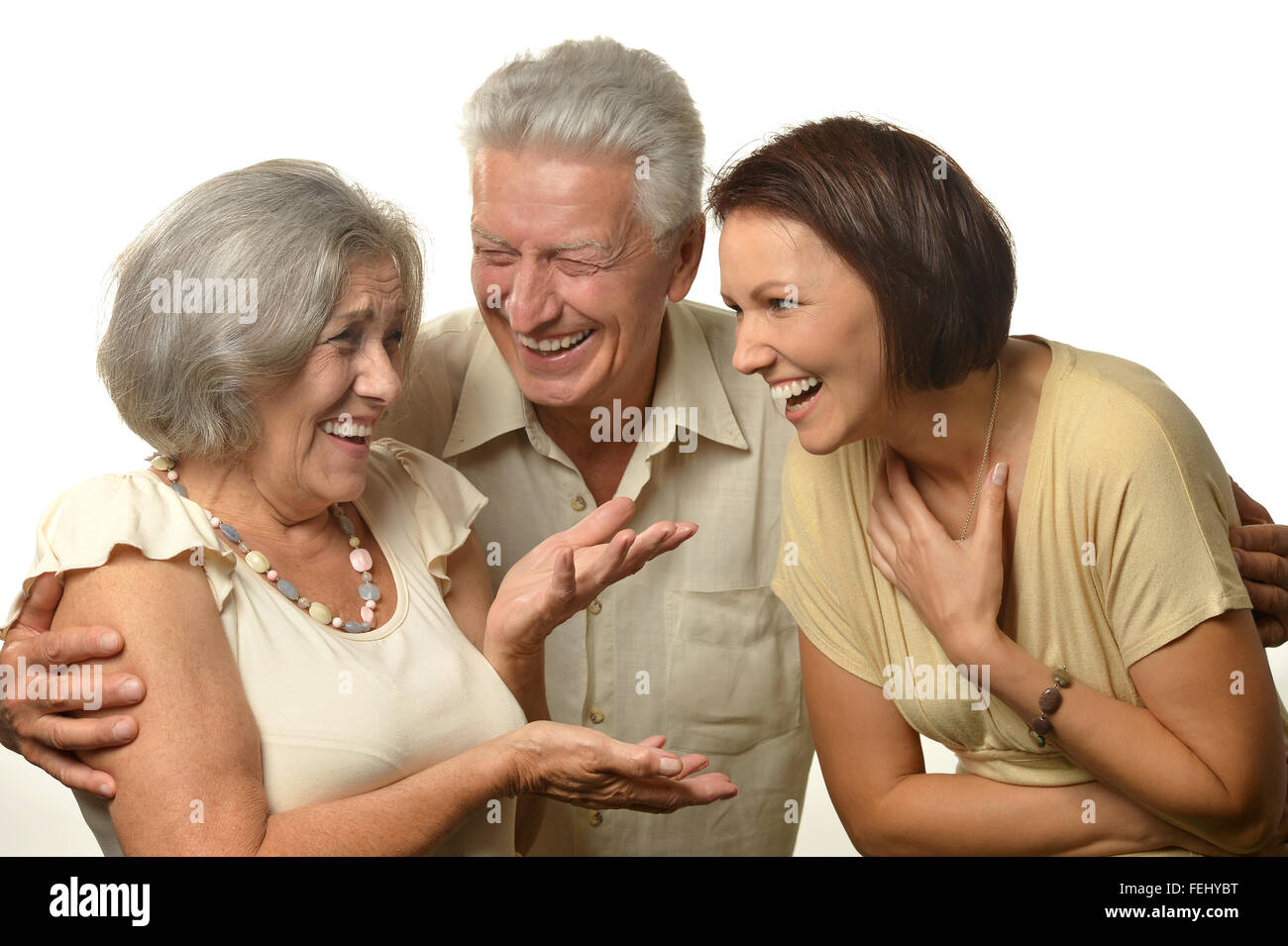 Happy senior parents with daughter Stock Photo