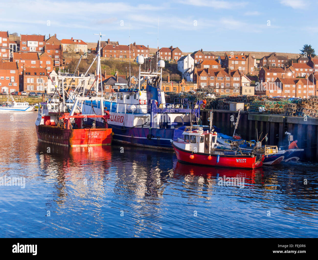 Fishing boats at Endeavour Wharf in Whitby harbour North Yorkshire UK