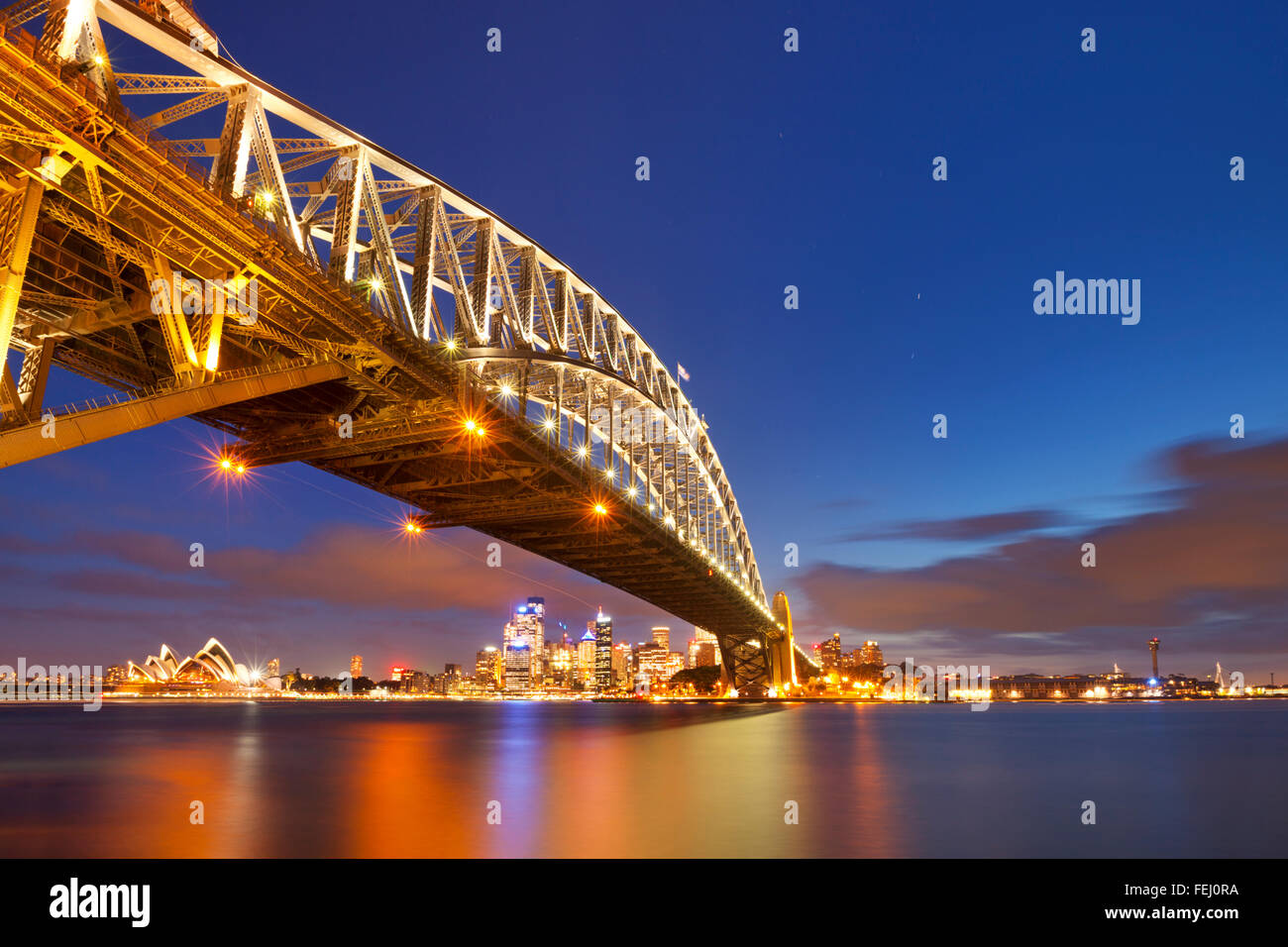 The Harbour Bridge, Sydney Opera House and Central Business District of Sydney. Photographed at night. Stock Photo