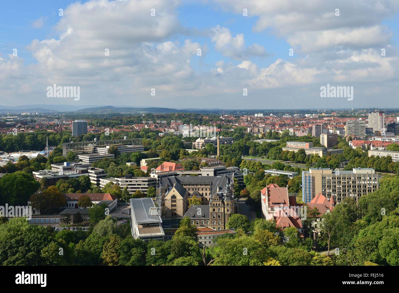 Hannover's west with police administration and the place Waterlooplatz and many green trees under a blue sky, 25 September 2015 Stock Photo