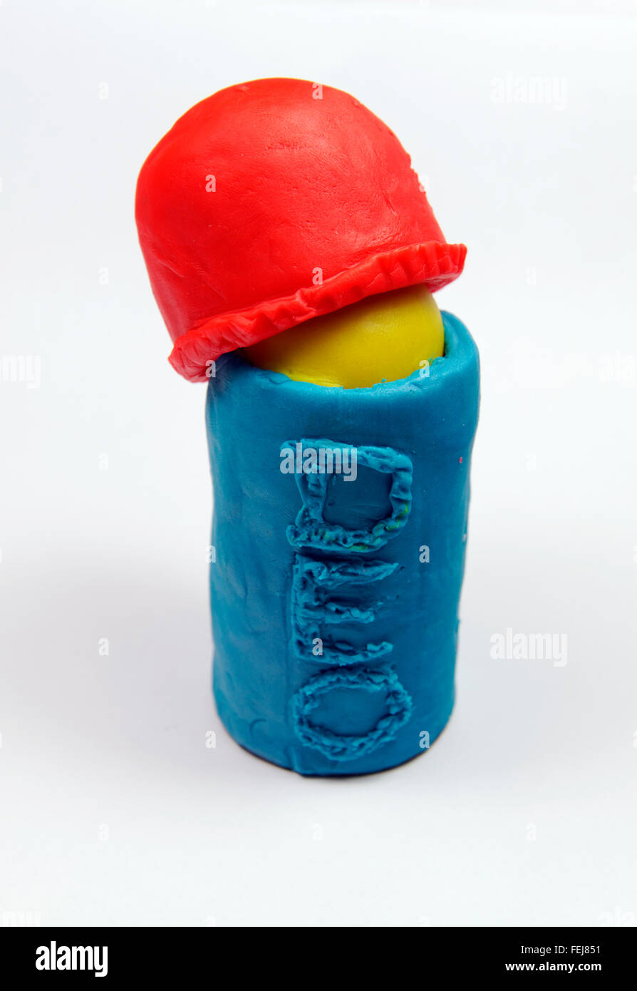 An opened plastic Play Doh container on a table Stock Photo - Alamy