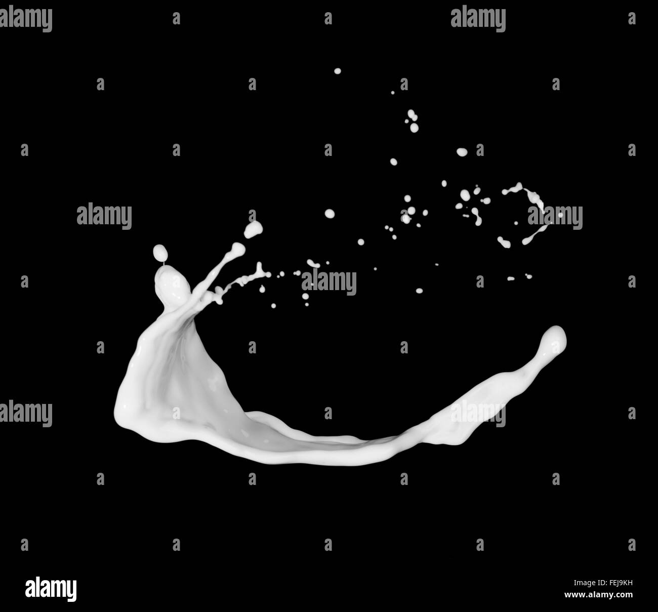 milk or white liquid splash isolated on black background Stock Photo