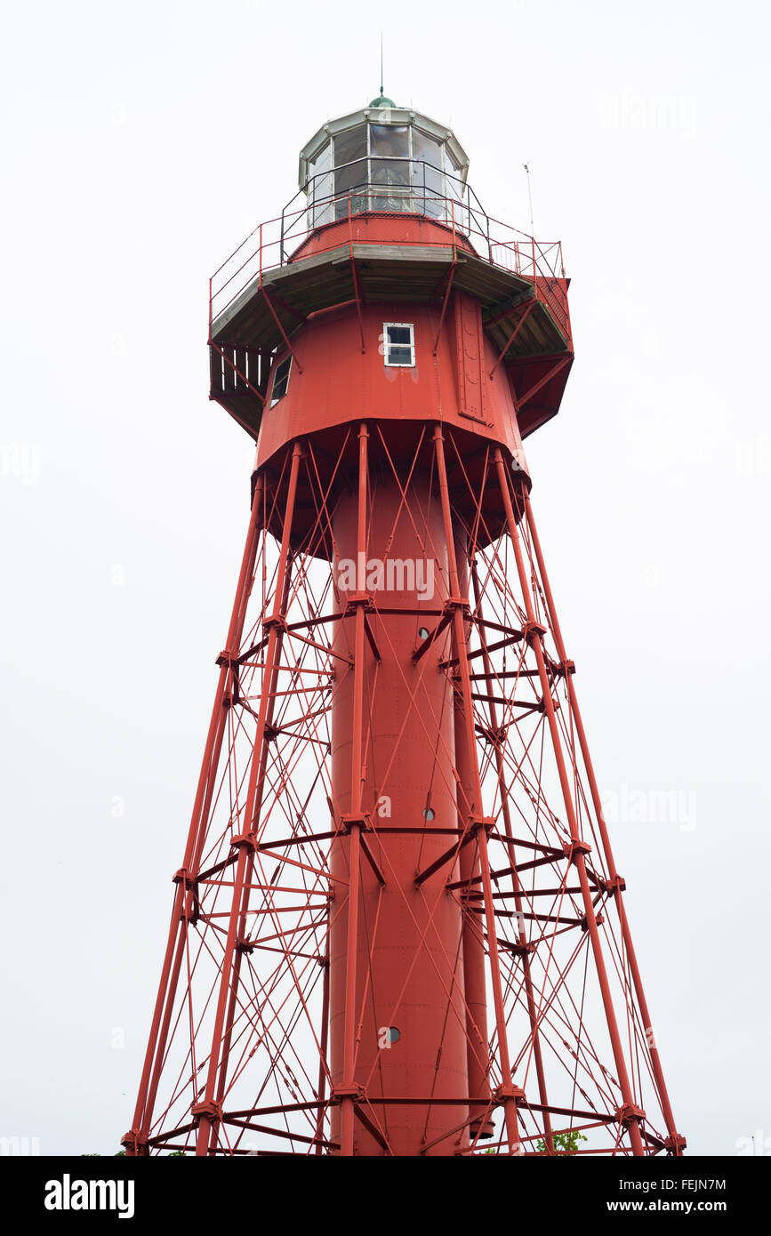 The red lighthouse of Sandhammaren near Ystad at the Swedish east coast and the Baltic Sea,Sweden Stock Photo