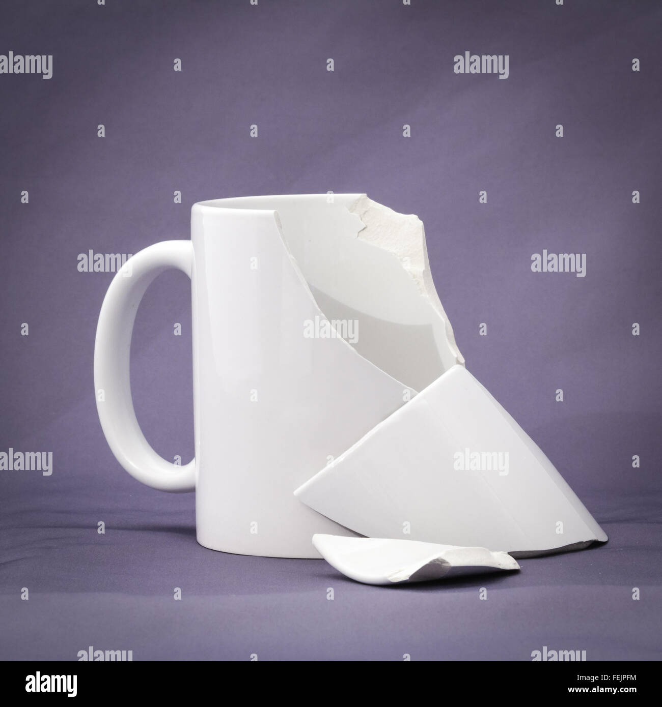 Broken ceramic cup Stock Photo