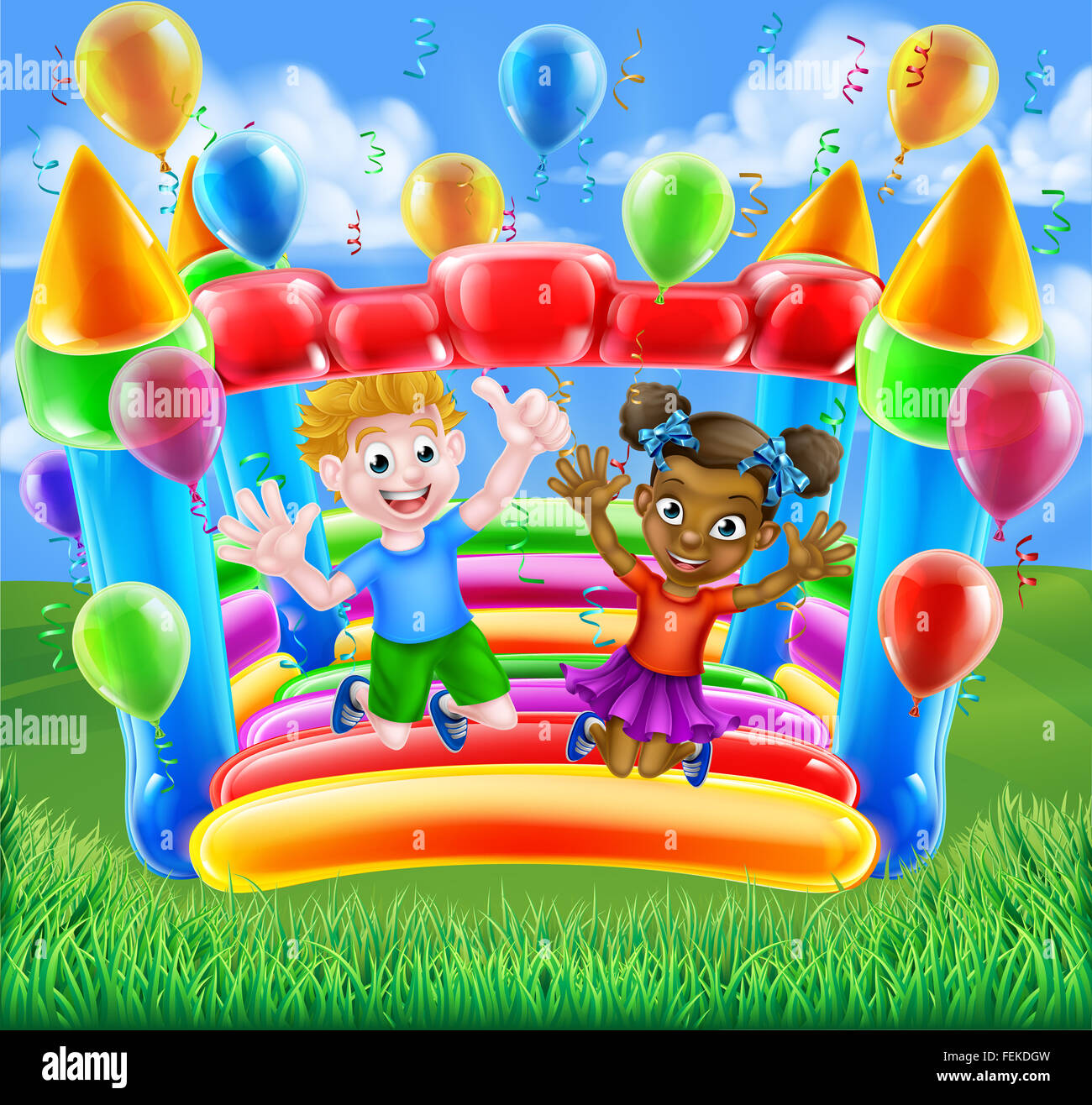 Two children, a boy and girl, having fun jumping on a bouncy castle with balloons and streamers Stock Photo