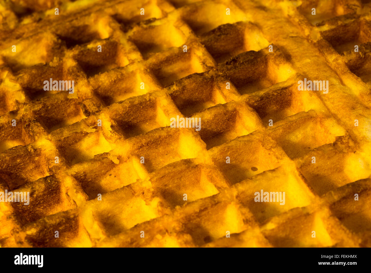 Honeycombed waffle texture - as visual metaphor for concept of cells, cellular, data storage / retrieval, filing systems, data. Stock Photo