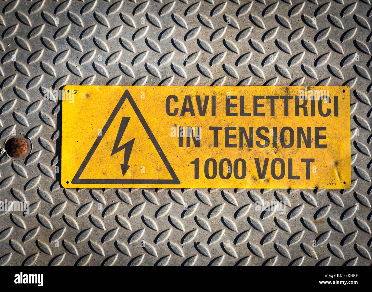 Danger sign for high voltage - electrical cables in voltage 1000 Volts- Stock Photo