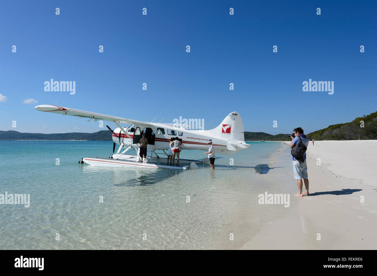 Air Whitsunday Seaplane with Tourists on Whitehaven Beach, Whitsunday Islands, Queensland, Australia Stock Photo