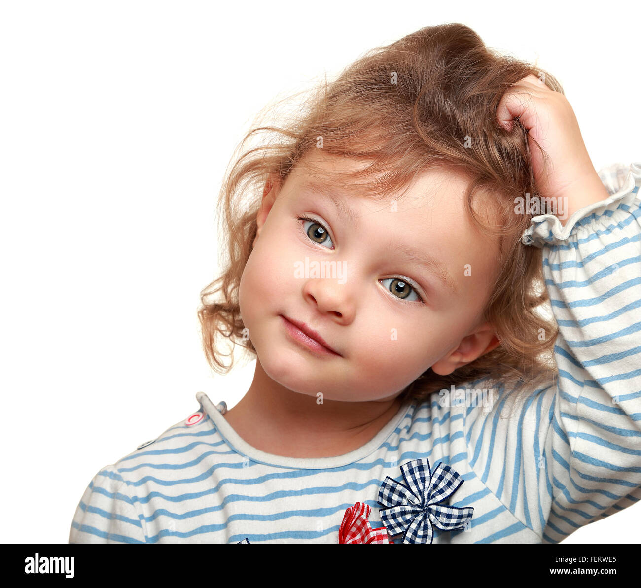 Cute small kid girl thinking holding the head. Isolated ...