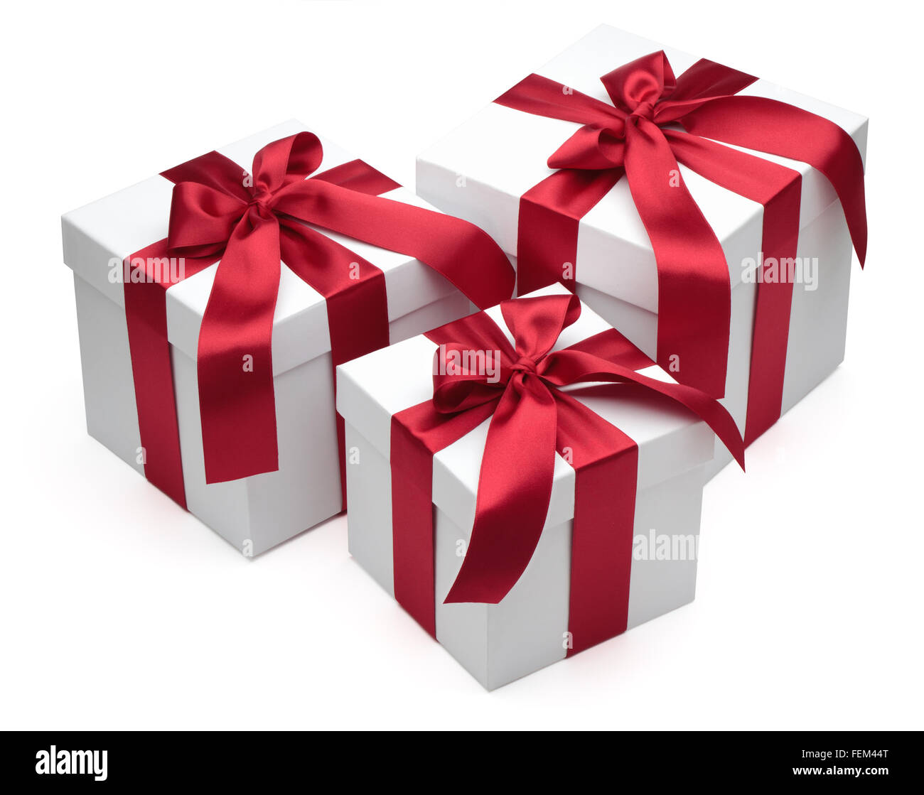 Gift boxes with red ribbons and bows isolated on the white background ...