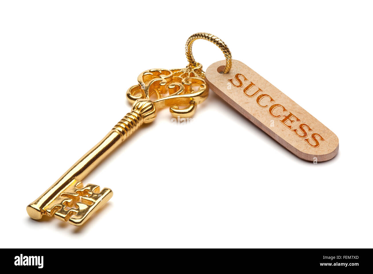 Golden key to success, isolated on the white background, clipping path included. Stock Photo