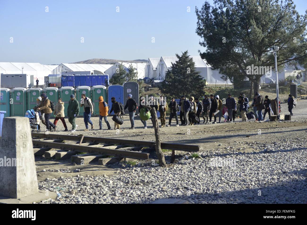 Gevgelija. 7th Feb, 2016. Refugees transit in Gevgelija, Macedonian south border to Greece on Feb. 7, 2016. More than one thousand migrants storm across Macedonia's border everyday. More than 65 thousands certificates expressing the intention to seek asylum have been issued by Macedonia since the beginning of 2016, most migrants are from Syria, Afghanistan and Iraq. Credit:  Liu Lihang/Xinhua/Alamy Live News Stock Photo