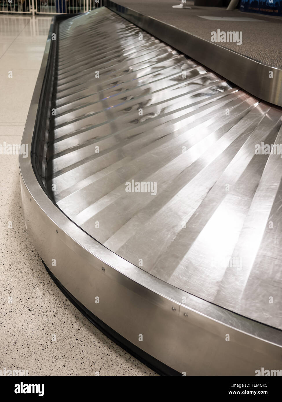 Airport baggage claim carousel conveyor with no luggage Stock Photo