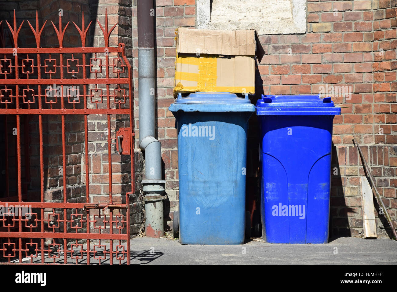 Trash cans in the backyard Stock Photo Alamy