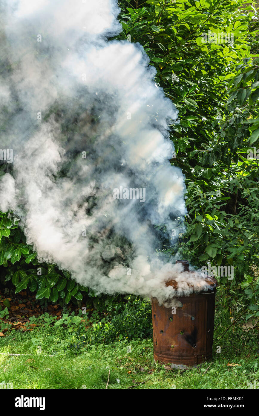 Incinerator burning garden waste Stock Photo Alamy