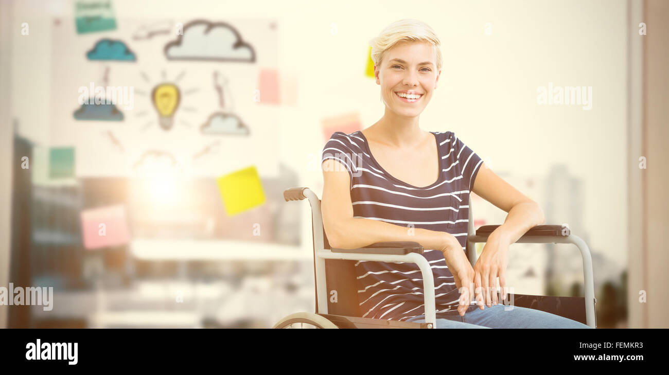 Composite image of smiling woman in a wheelchair Stock Photo - Alamy