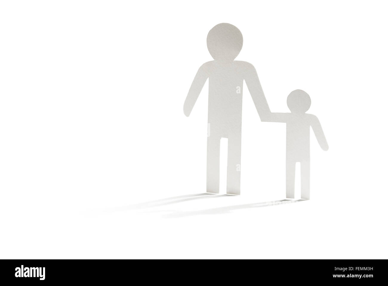Single father with son, paper figures Stock Photo